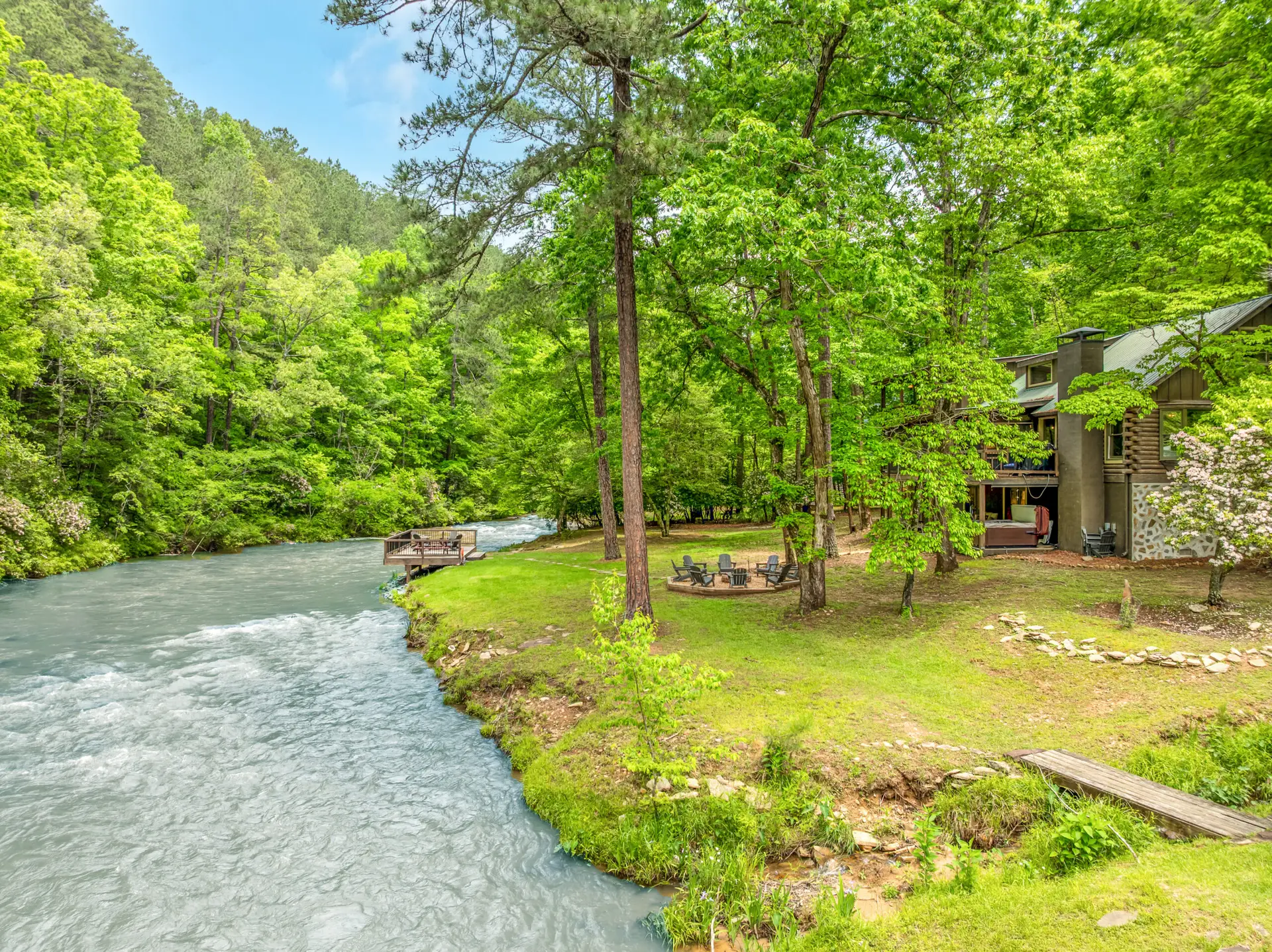An old Cherokee fishtrap sits right behind the cabin to help direct the rainbow trout