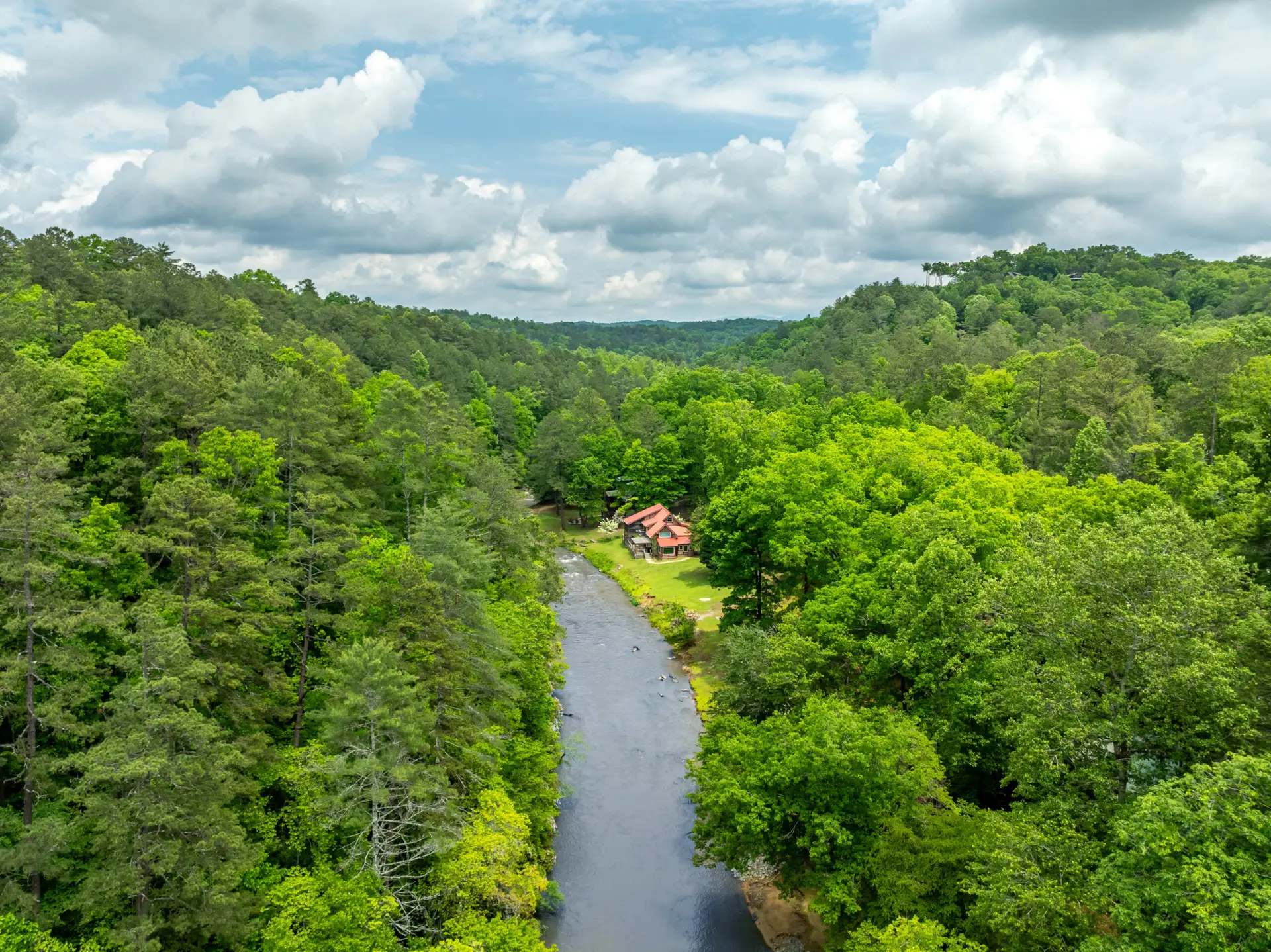 Looking downriver with Elestay cabins as far as one can see