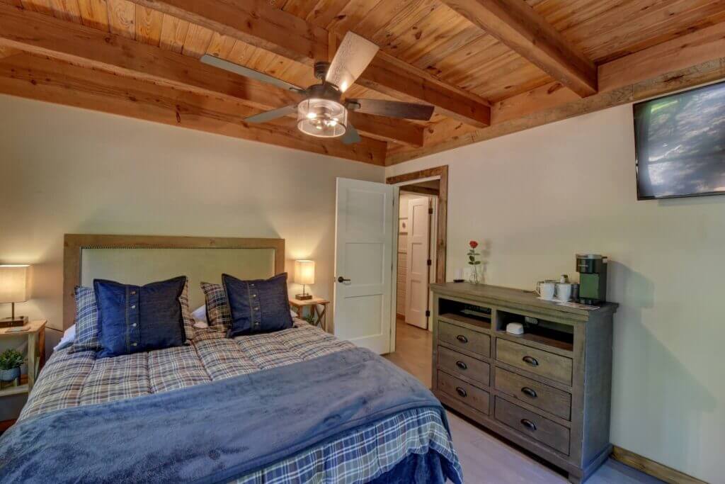 Our 2nd main level bedroom has another queen bed along with all the same amenities as the first