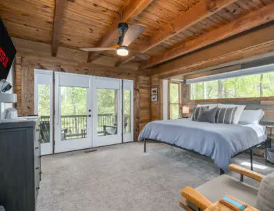 Our main level master bedroom is an escape to paradise. With an ensuite bath, large french doors with hideaway screens, balcony, and all our luxury amenities you won't want to leave. TV, coffee maker, flashlights, Echo speaker, reading chair