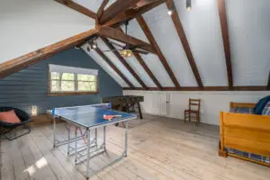 Find foosball and 3/4 ping pong in the gameroom for the competitive ones in your group along with overflow sleeping via a twin daybed with trundle