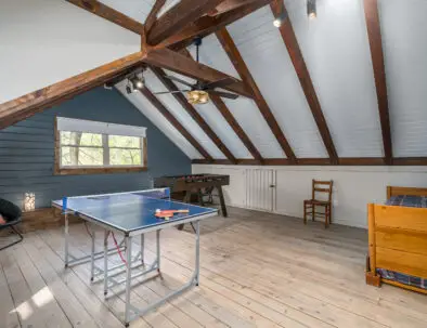 Find foosball and 3/4 ping pong in the gameroom for the competitive ones in your group along with overflow sleeping via a twin daybed with trundle