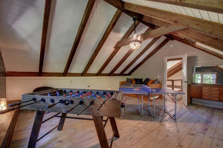 Find foosball and 3/4 ping pong in the gameroom for the competitive ones in your group along with overflow sleeping via a twin daybed with trundle