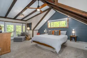 Along with the king bed you will find a comfortable chaise by the river view for your relaxing pleasure and access to the private ensuite bathroom