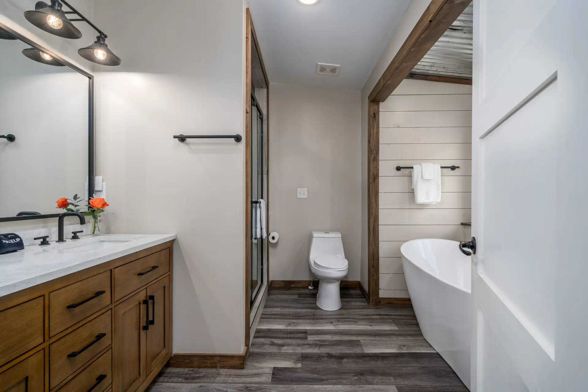 The private ensuite bath in the upper master includes a double vanity, separate shower, and all you need for your stay