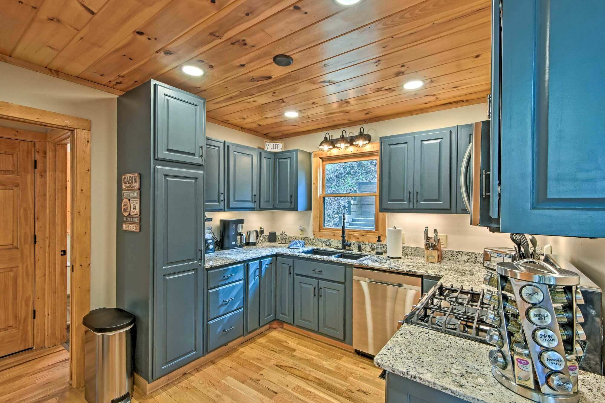 A modern kitchen for your enjoyment. All the special touches you need including coffee from kCups, French Press, or Traditional Brew. Grinder included.