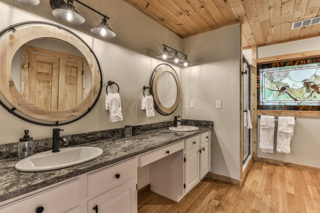 A large double vanity awaits in the master bath