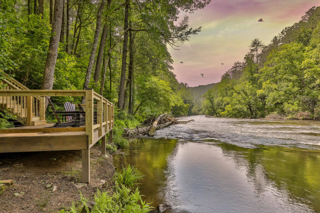 Run to the river and take in the beautiful view from the large riverside deck