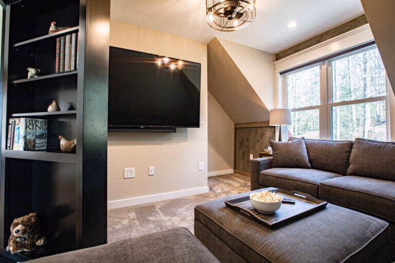 Movie room with 75" Smart TV for cozy film nights at The Farmhouse